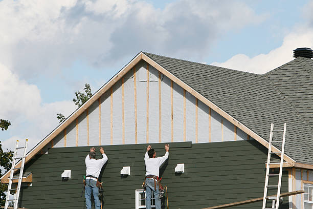 Professional Emergency Siding Repair technician working in Bellaire, TX